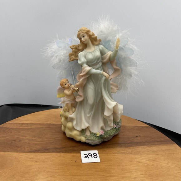 The Unbranded Brand Other - Angel  With Feather Fiber Optic Lights Up And Plays Hark The Herald Angels Sing